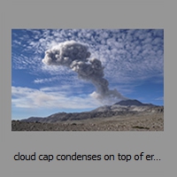 cloud cap condenses on top of eruption
